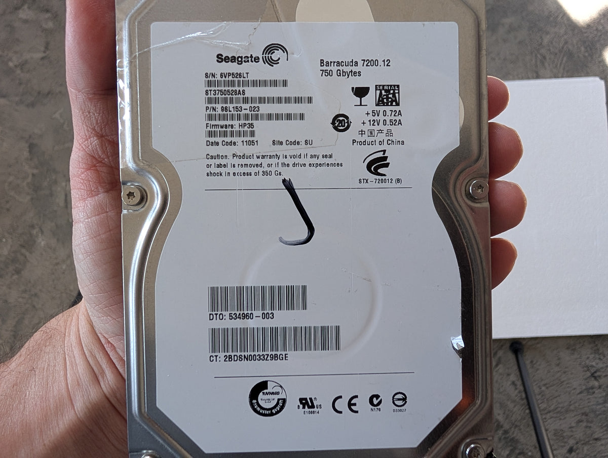 750GB Seagate, ST3750528AS, (1 Reallocated Sector)